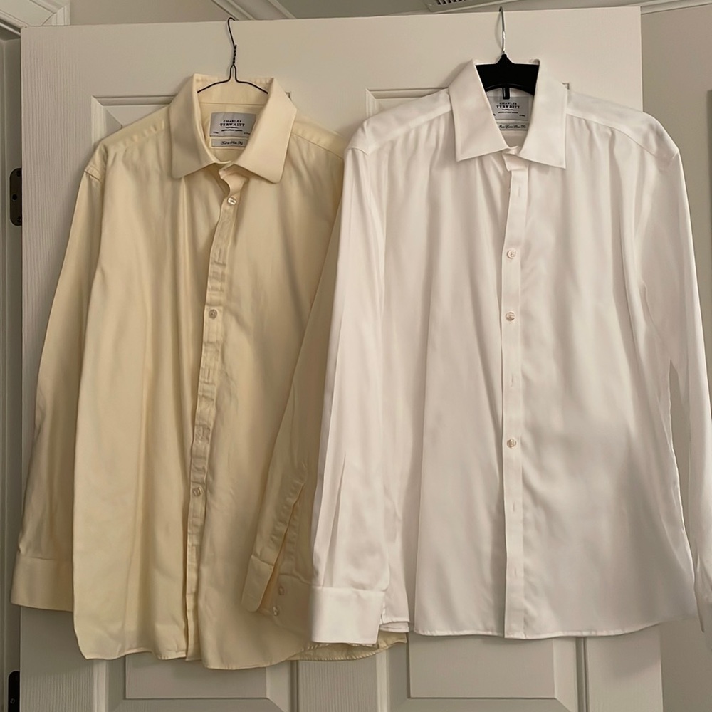 Men’s ivory and a white dress shirts